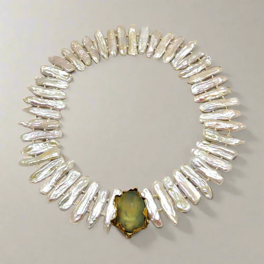 Necklace with baroque pearls and 14k gold close with an aquamarine cabochon stone - Dinos-Virginia