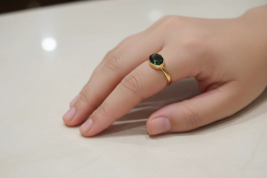 Ring in 14k gold with a green tourmaline (B-117)