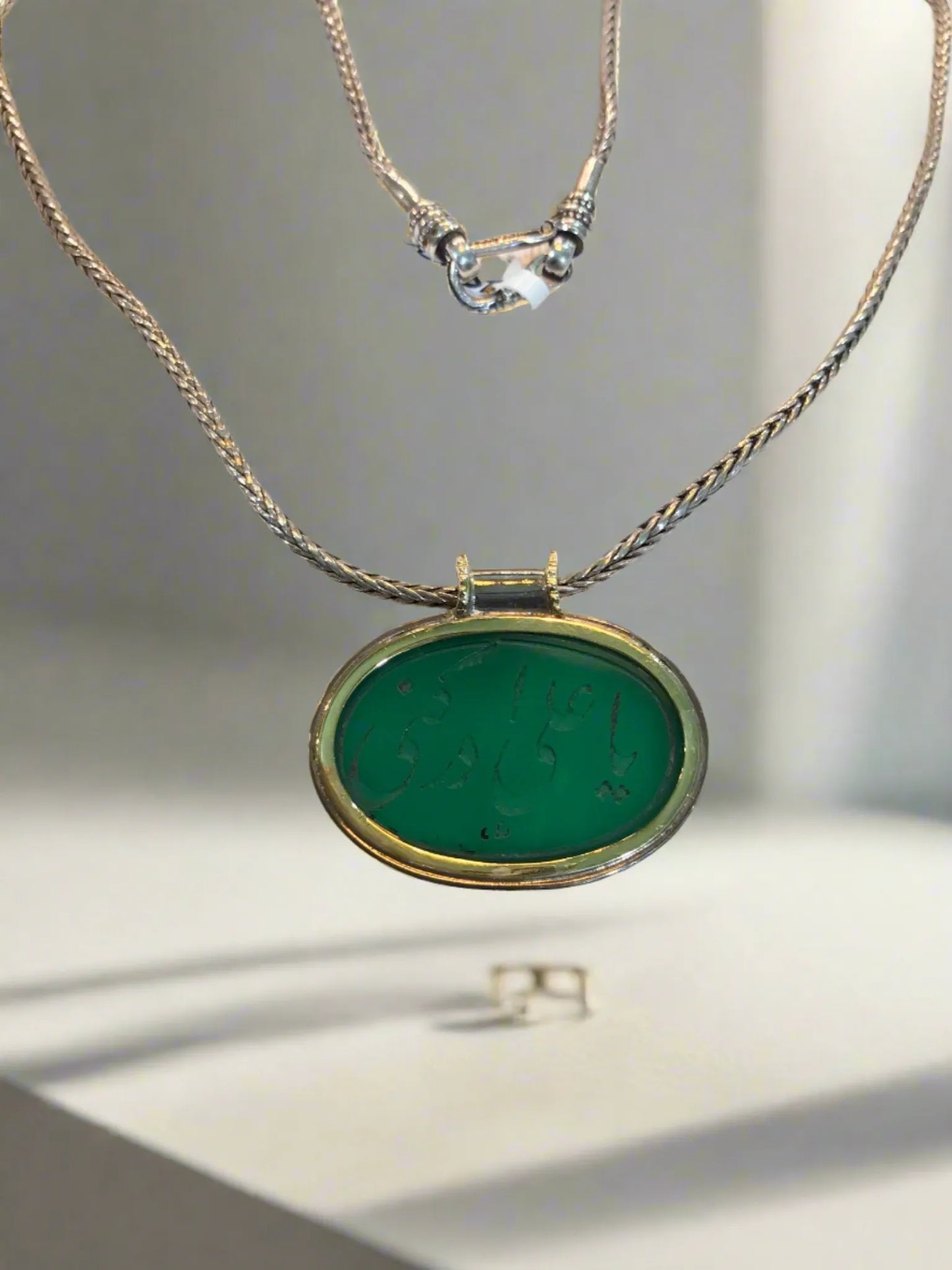 Gold and silver medallion with a seal stone green agate, Medallion