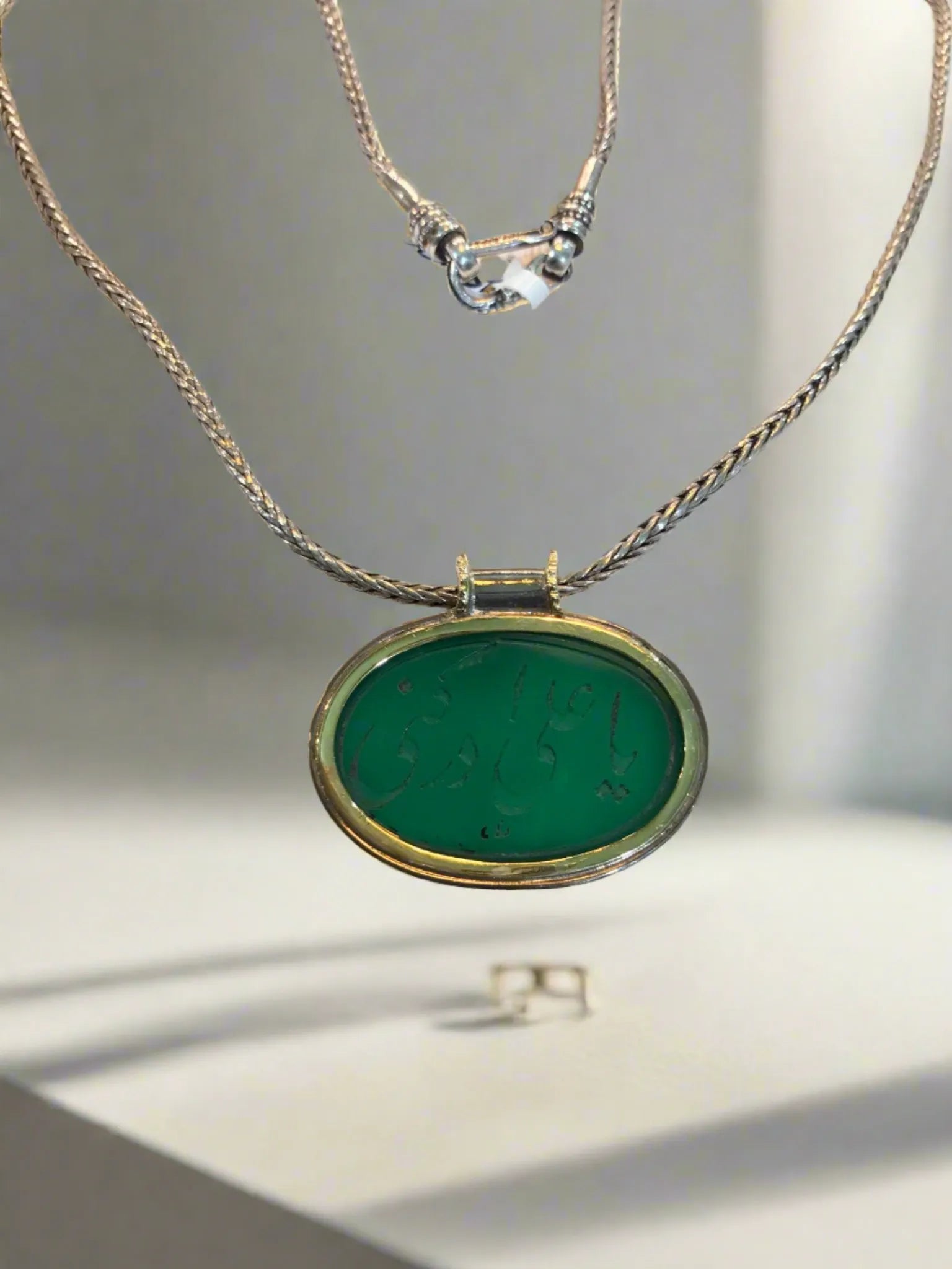 Gold and silver medallion with a seal stone green agate, Medallion