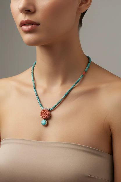 Necklace in turquoise stones and coral stones, coral stone in rose design, white 18k gold
