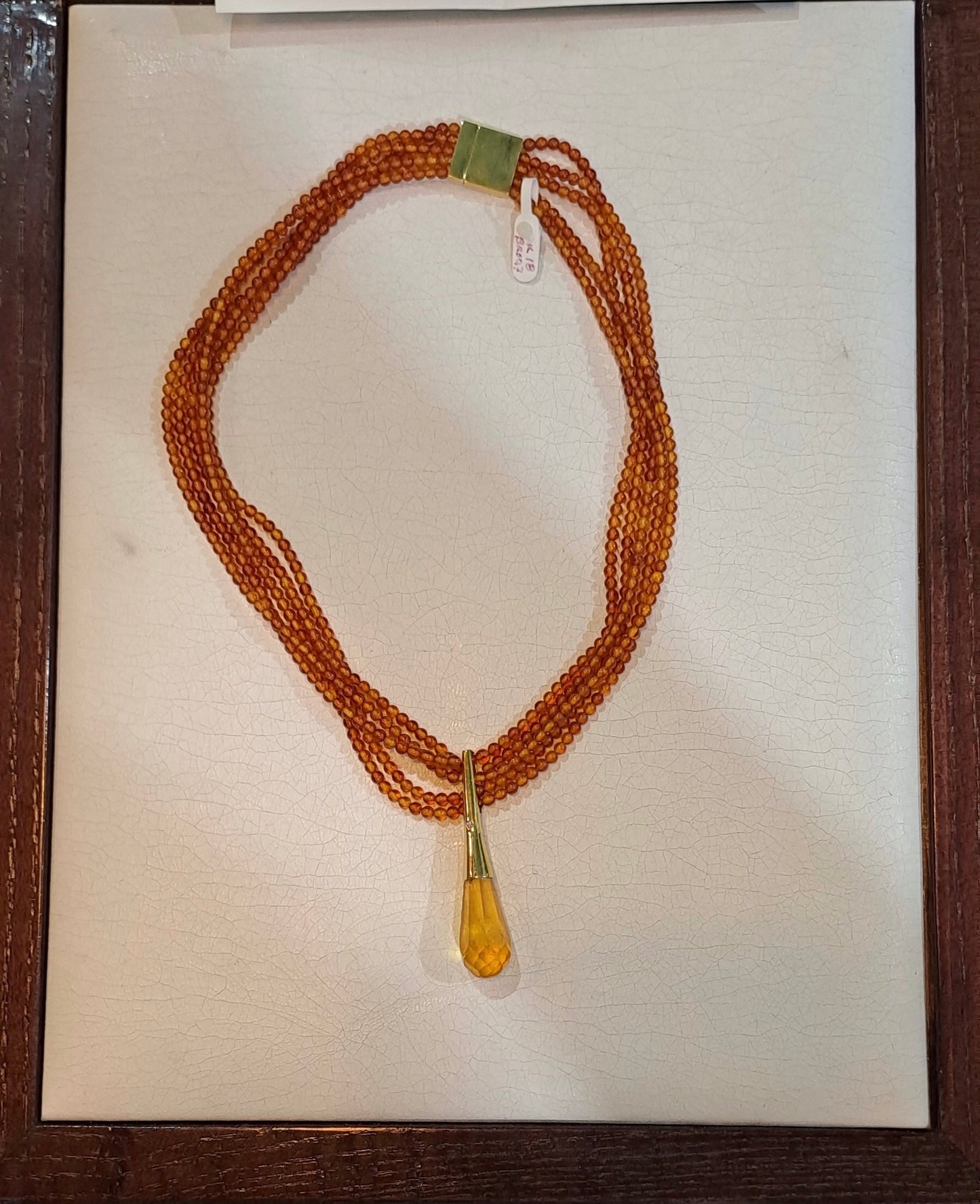 Necklace with Amber and medallion with brilliant in gold 18k - Dinos-Virginia