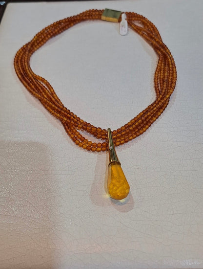 Necklace with Amber and medallion with brilliant in gold 18k - Dinos-Virginia