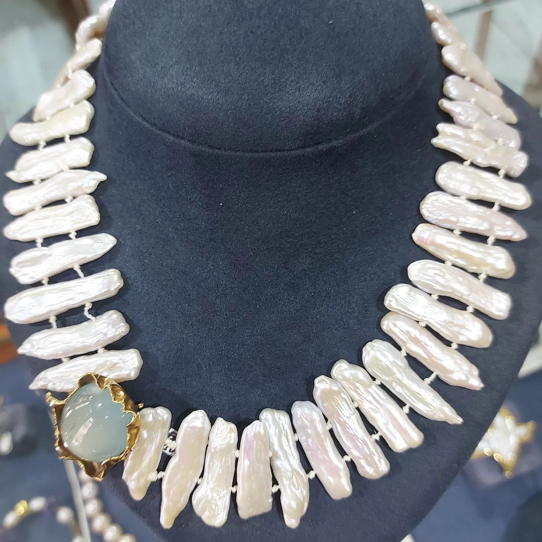 Necklace with baroque pearls and 14k gold close with an aquamarine cabochon stone - Dinos-Virginia