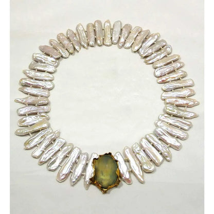 Necklace with baroque pearls and 14k gold close with an aquamarine cabochon stone - Dinos-Virginia