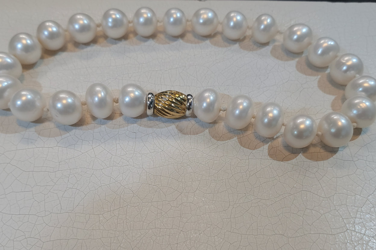 Necklace with potato shape pearls with 18k gold closure, one of a kind closure