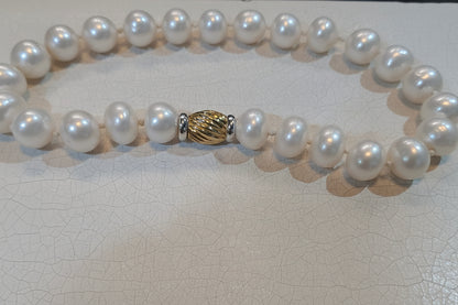 Necklace with potato shape pearls with 18k gold closure, one of a kind closure