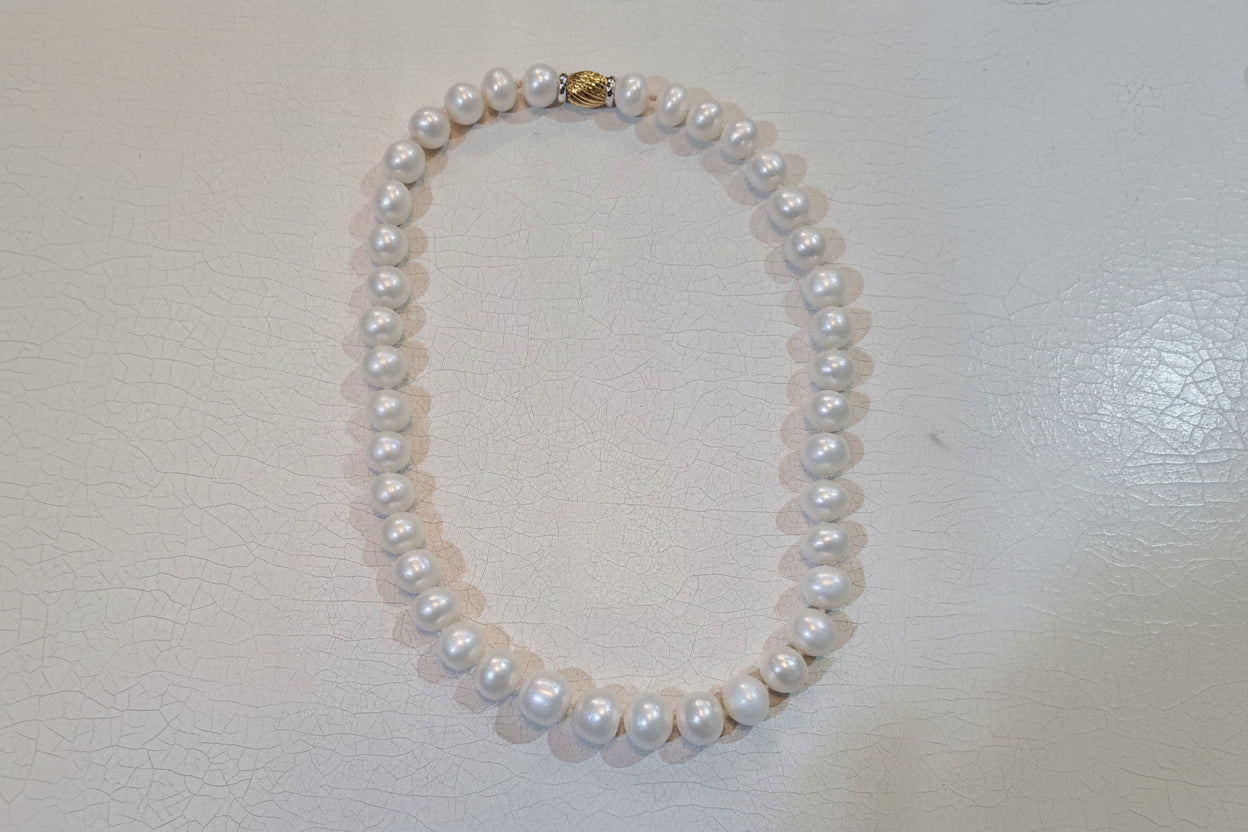 Necklace with potato shape pearls with 18k gold closure, one of a kind closure