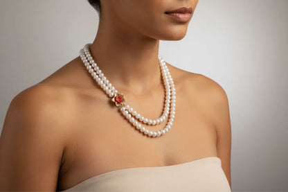 Necklace with two row pearls and 14k gold element, flower design element