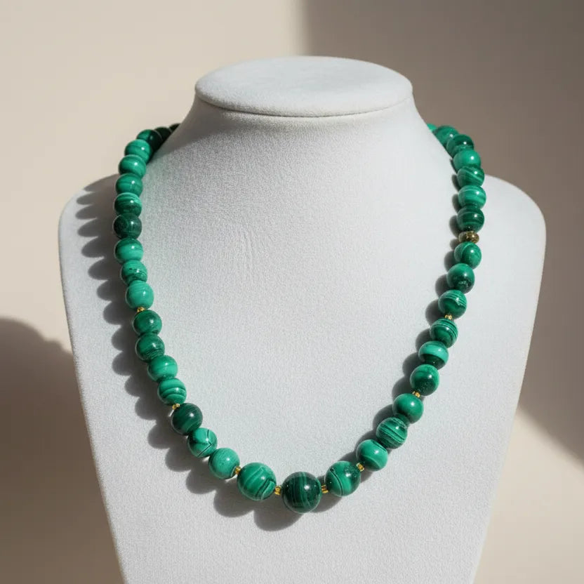 Necklaces with Malachite stones and gold 185k elements