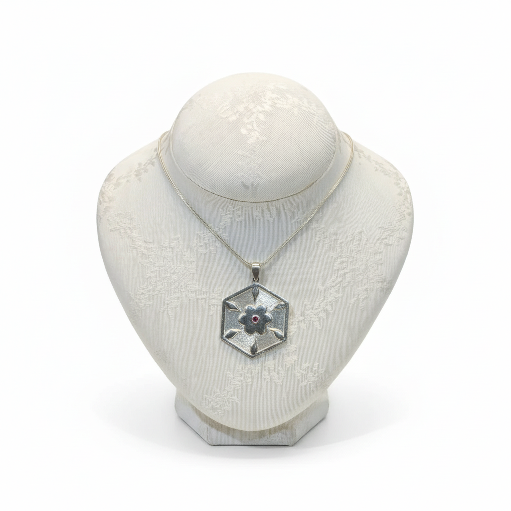 Pendant in Sterling Silver and 14k Gold with a round ruby stone (PE-76)