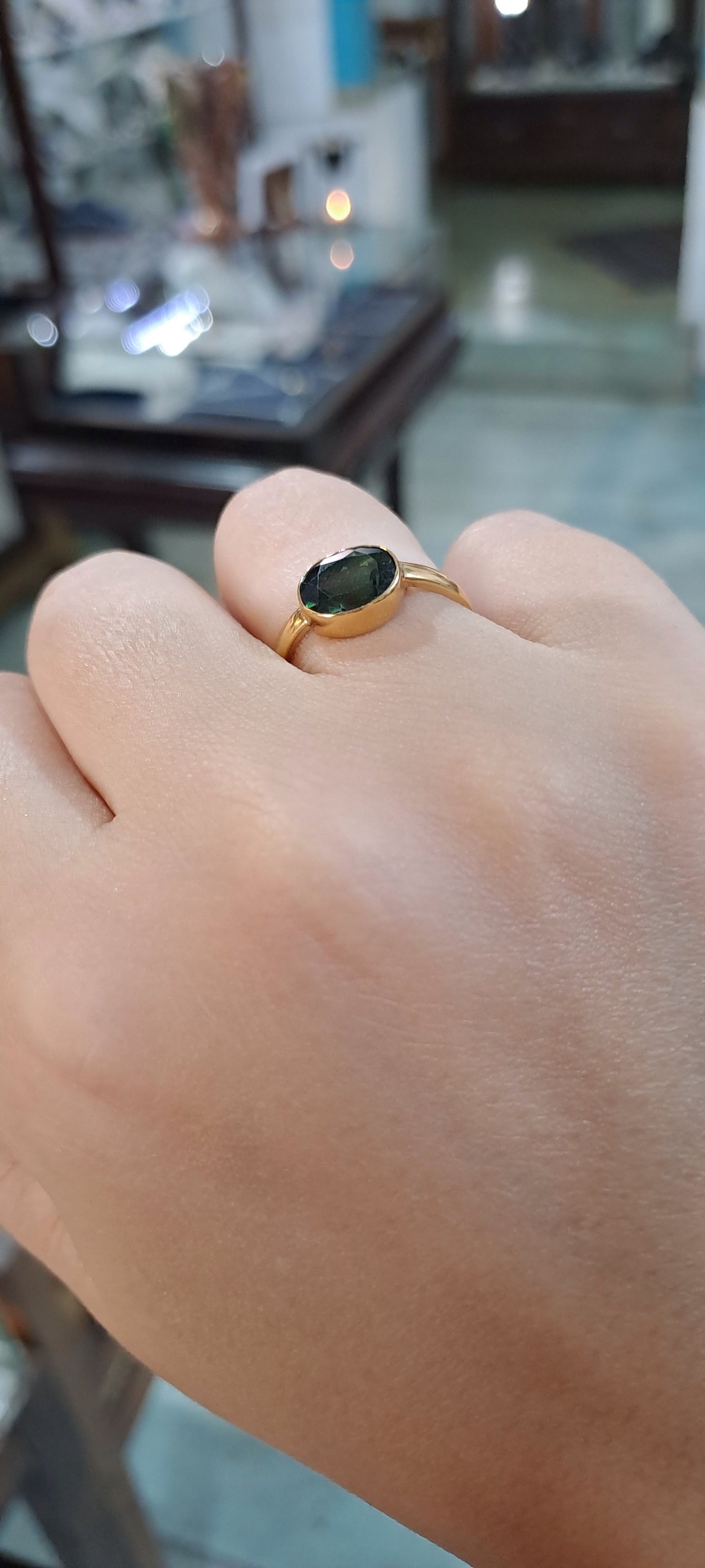 Ring in 14k gold with a green tourmaline (B-117)