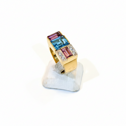 Ring in 18k Gold with Bleu Topaz 35c Tourmalines 35c and Brilliants 0.05 c. (B-72)
